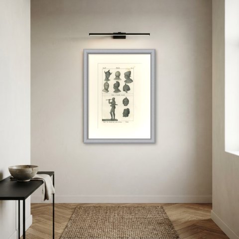 Ancient Helmets and a Bronze Warrior Hurling a Javelin, Lithograph, 1842, shown framed on a wall